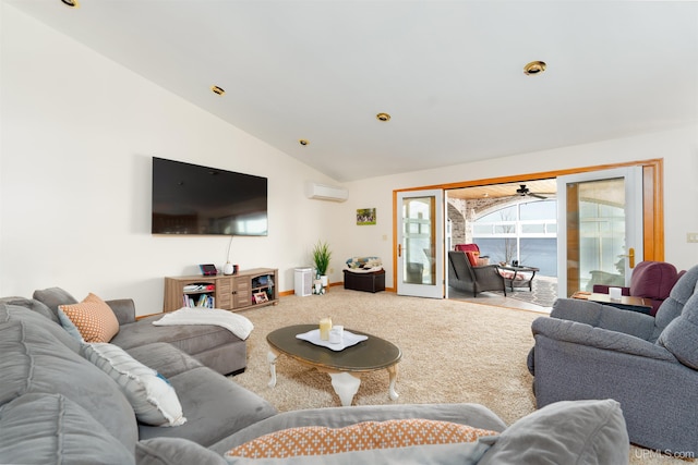 carpeted living room with an AC wall unit, ceiling fan, and vaulted ceiling