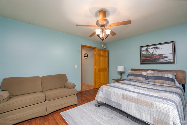 bedroom featuring ceiling fan and wood-type flooring