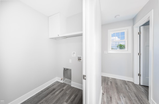 washroom featuring hardwood / wood-style flooring and washer hookup