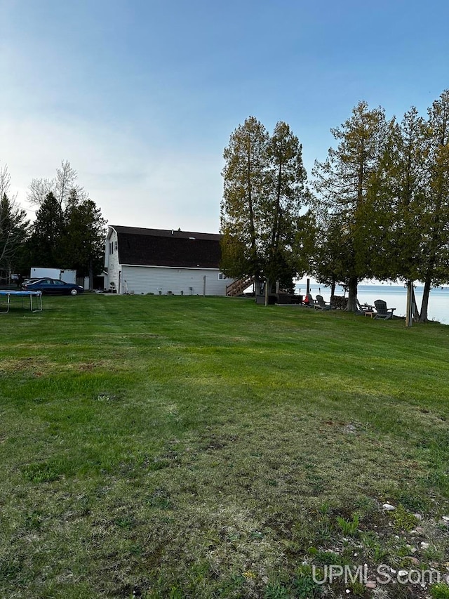 view of yard with a water view