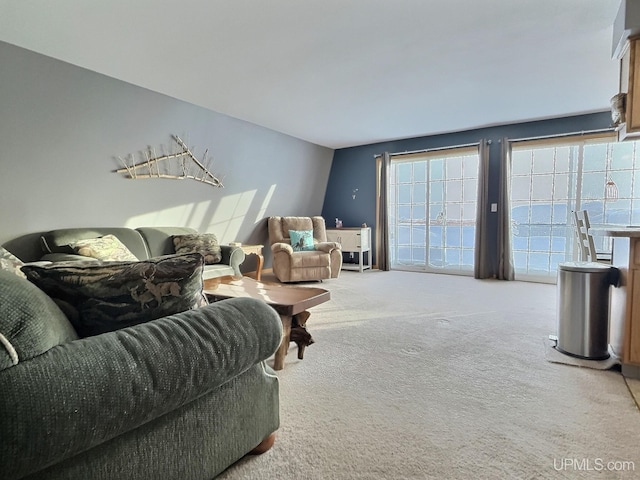 living room with light colored carpet