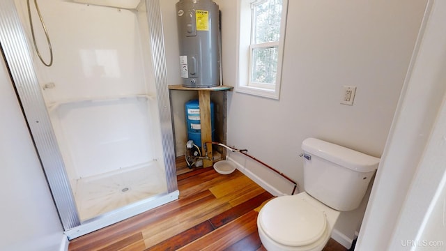 bathroom featuring a shower, hardwood / wood-style flooring, toilet, and water heater