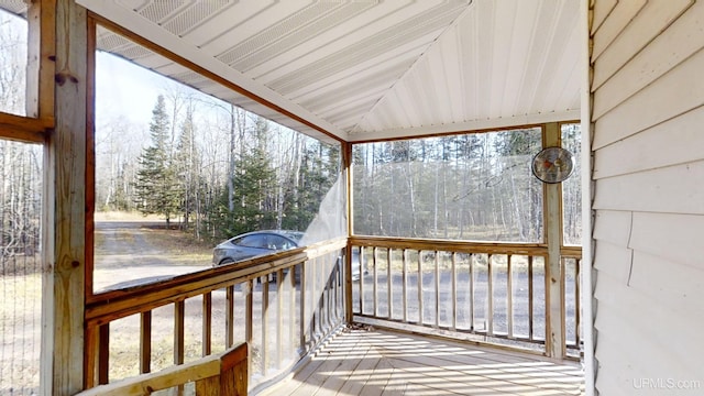 wooden terrace featuring covered porch