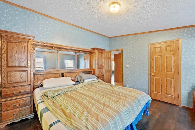 bedroom featuring ornamental molding, a textured ceiling, and dark wood-type flooring