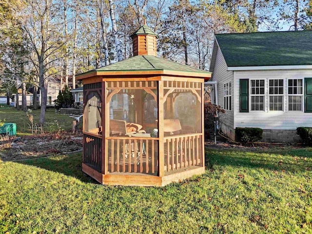 view of outbuilding with a gazebo and a yard