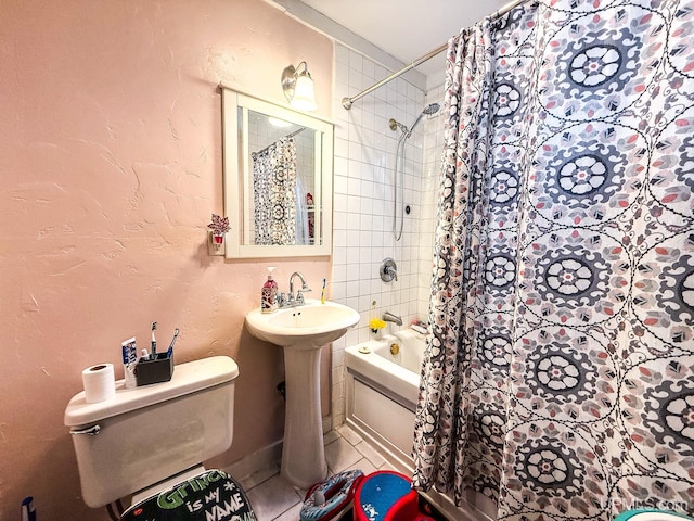 bathroom with tile patterned flooring, toilet, and shower / bathtub combination with curtain