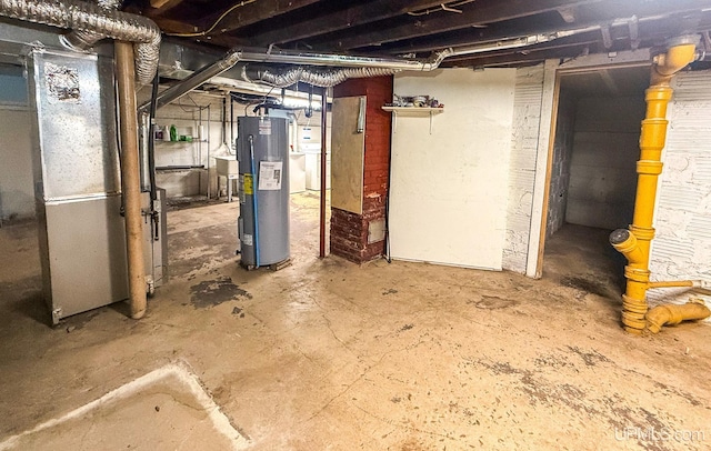 basement with heating unit and water heater