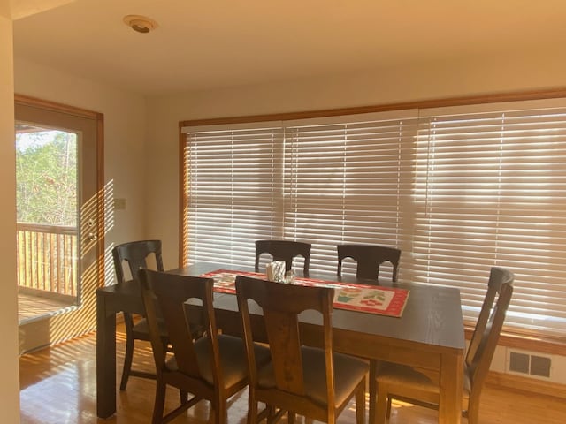 dining area featuring wood-type flooring