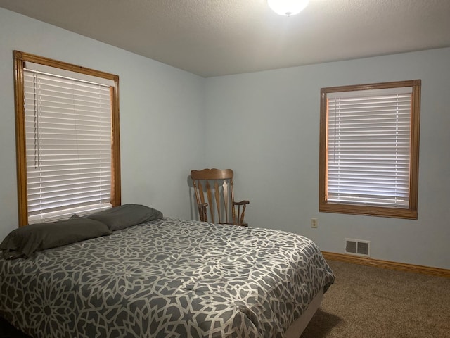 bedroom featuring carpet flooring