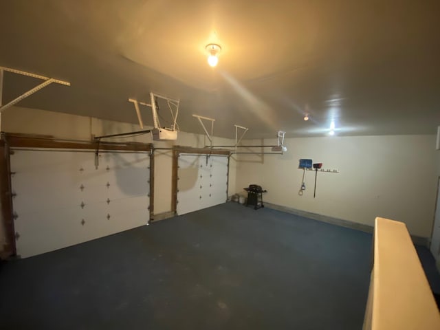 2250 Dryer Rd, Standish, MI 48658 - garage featuring a garage door opener
