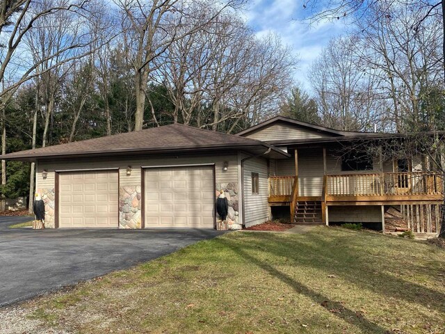 2250 Dryer Rd, Standish, MI 48658 - single story home featuring a front yard and an attached garage