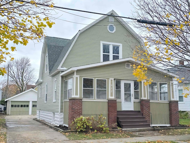 view of front of house featuring an outbuilding and a garage