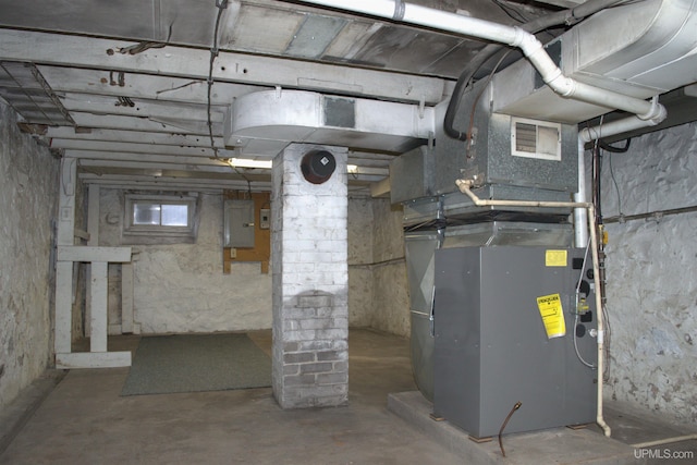 basement featuring electric panel