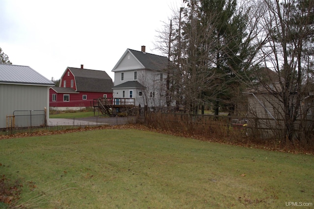 view of yard featuring a wooden deck