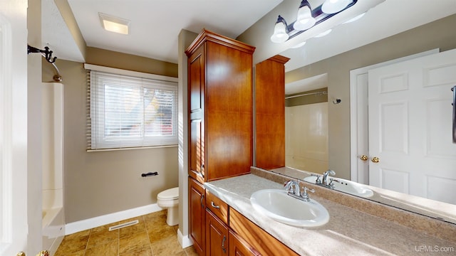 full bathroom with washtub / shower combination, vanity, and toilet