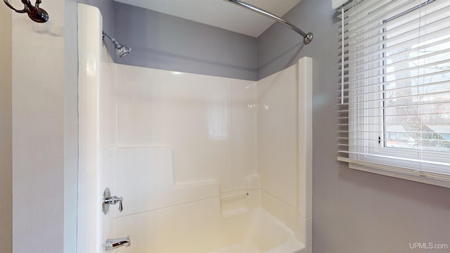 bathroom featuring bathing tub / shower combination