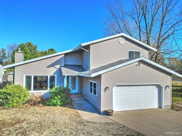 view of front of property with a garage