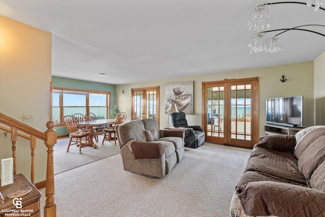 carpeted living room with french doors