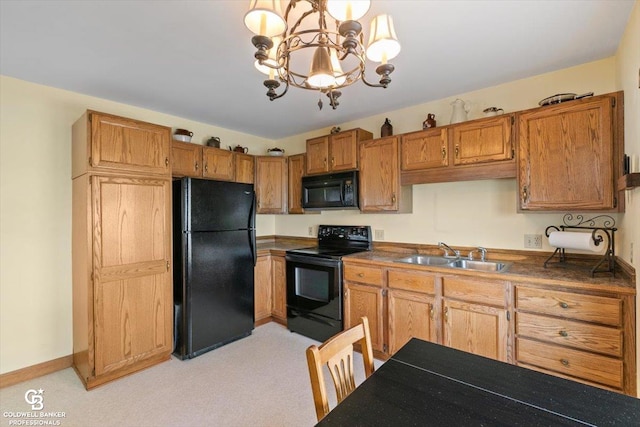 kitchen with sink, an inviting chandelier, pendant lighting, light carpet, and black appliances