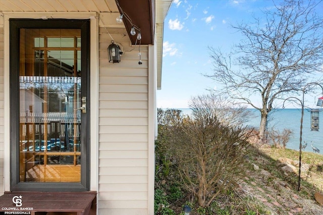 property entrance with a water view