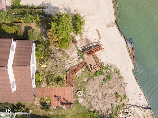 birds eye view of property featuring a water view