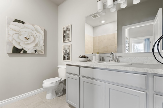 bathroom with tile patterned floors, walk in shower, vanity, and toilet