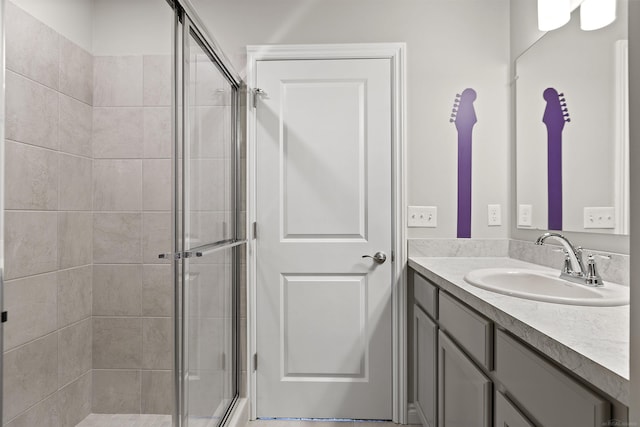 bathroom featuring vanity and walk in shower