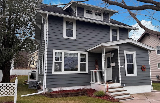 view of front of home with a front yard