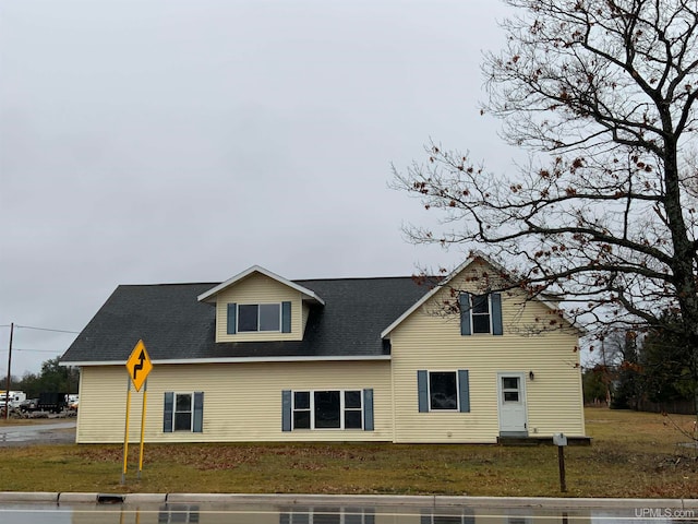 view of property exterior featuring a yard