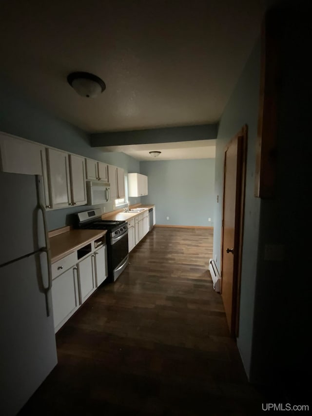 kitchen featuring baseboard heating, white cabinetry, dark hardwood / wood-style floors, and white appliances