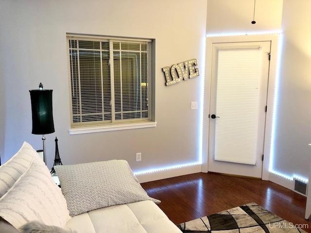 living room featuring dark hardwood / wood-style flooring