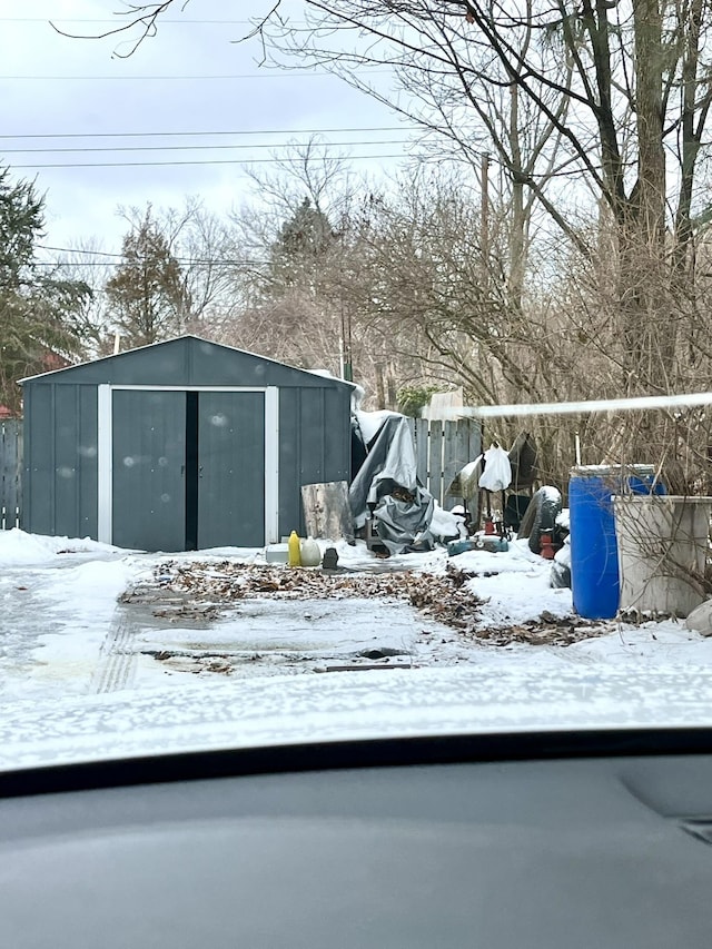 exterior space with a storage shed