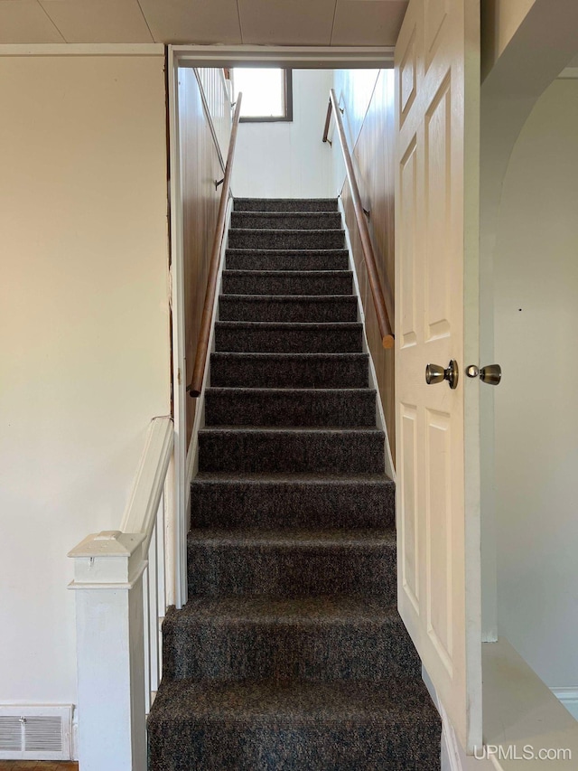 stairs with carpet floors