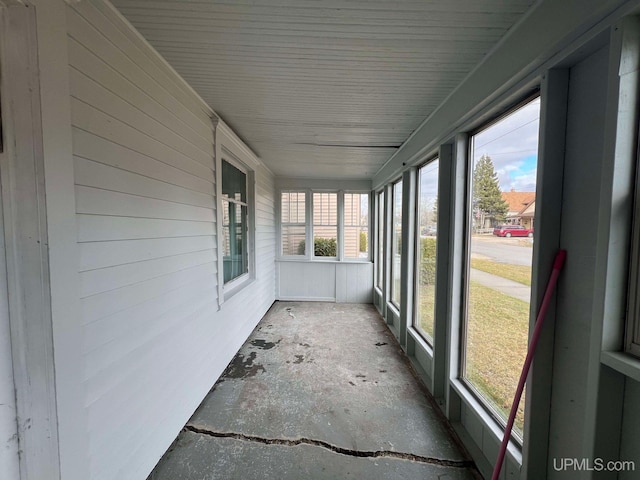 unfurnished sunroom with plenty of natural light