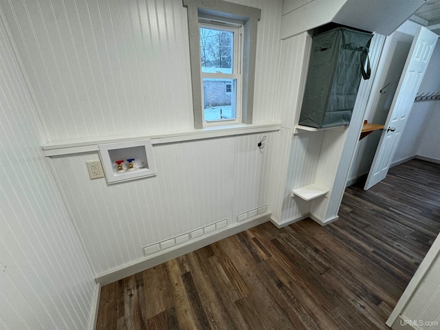 clothes washing area with washer hookup and dark hardwood / wood-style flooring