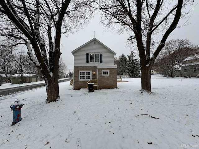 view of snow covered house