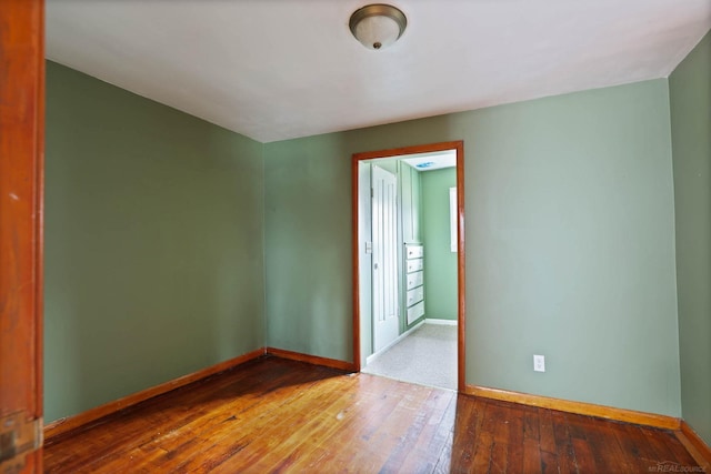 empty room featuring hardwood / wood-style floors