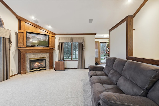 carpeted living room featuring vaulted ceiling and ornamental molding