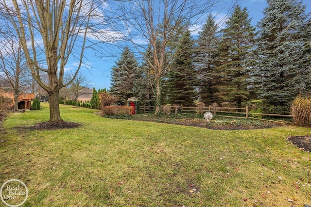 view of yard with fence