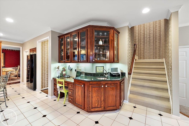 bar with recessed lighting, a sink, ornamental molding, stairway, and freestanding refrigerator