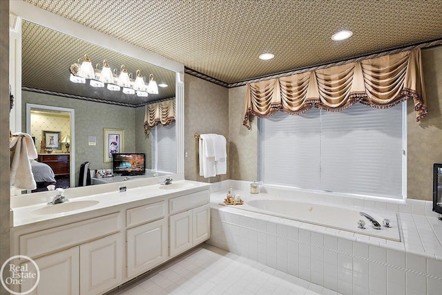 full bathroom featuring connected bathroom, a garden tub, a sink, and double vanity