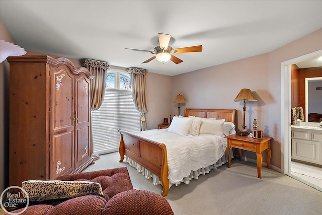 bedroom featuring a ceiling fan and light colored carpet