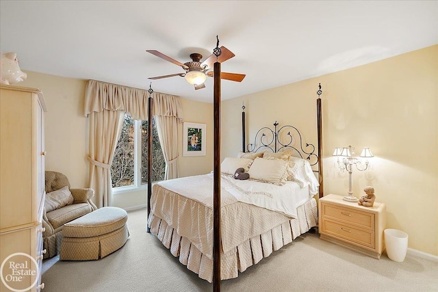 bedroom featuring ceiling fan, carpet, and baseboards