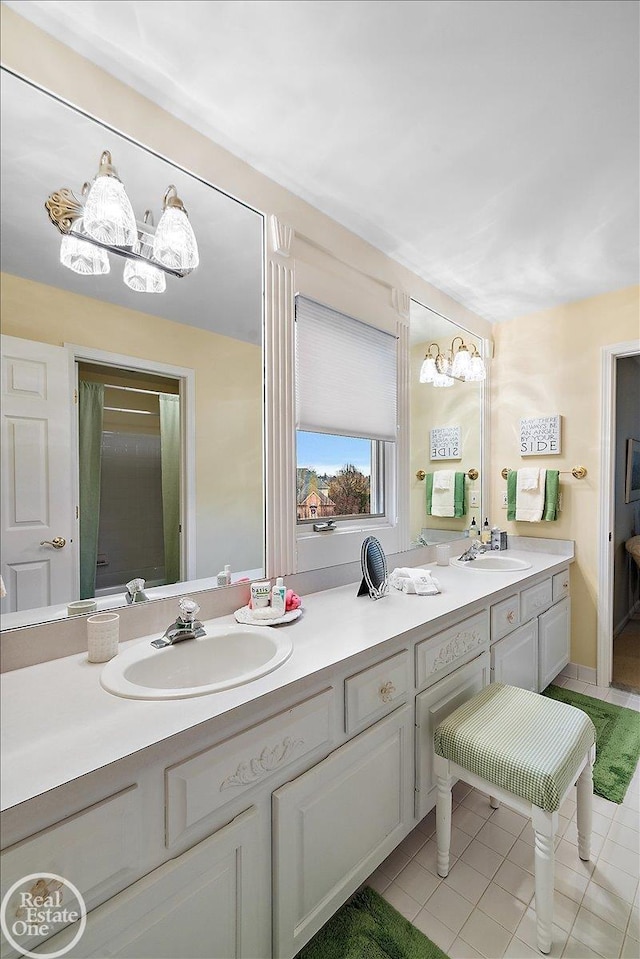 bathroom featuring vanity and tile patterned floors