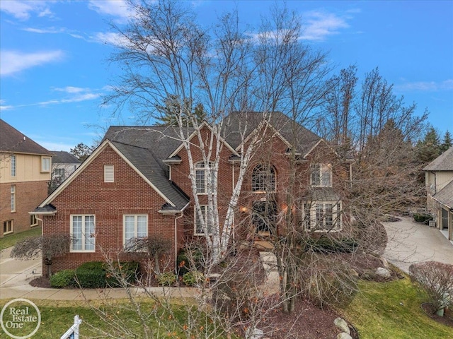 traditional home with brick siding