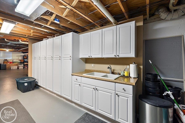 unfinished basement with a sink