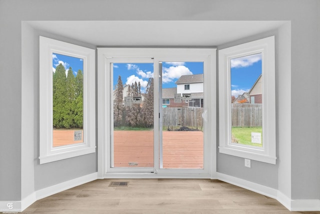 doorway featuring light hardwood / wood-style floors