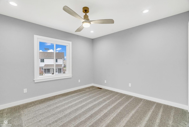 unfurnished room featuring carpet flooring and ceiling fan