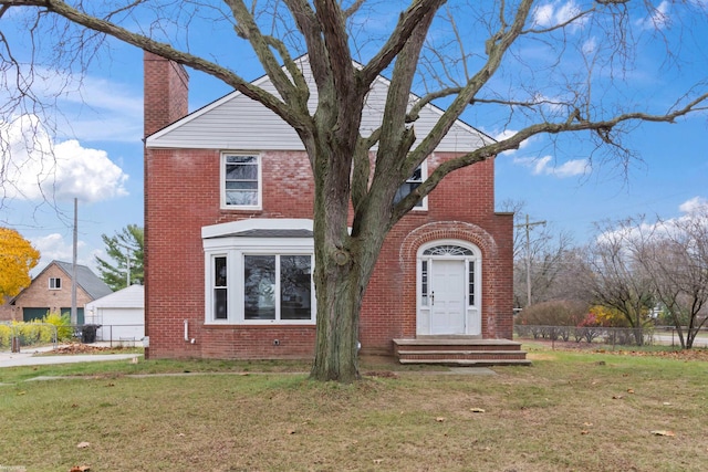 view of front of property with a front lawn