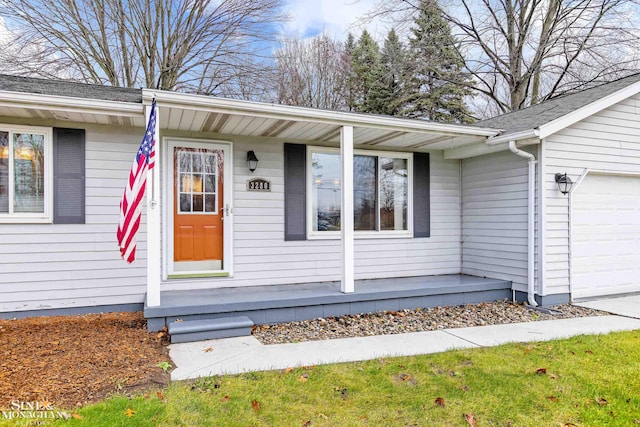 property entrance featuring a garage